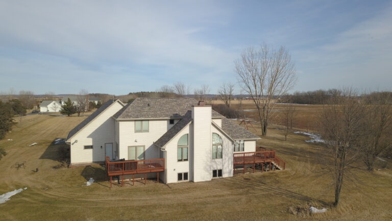 Sand Dune with cream color siding in Wrightstown WI
